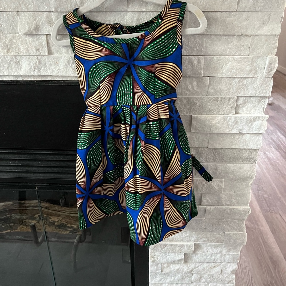 African design, gold, green and royal blue dress.